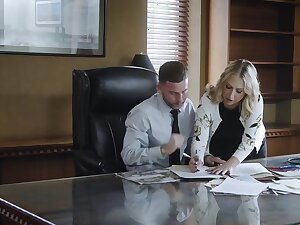 Blonde secretary is fucked in manifestation and pussy by a horny boss